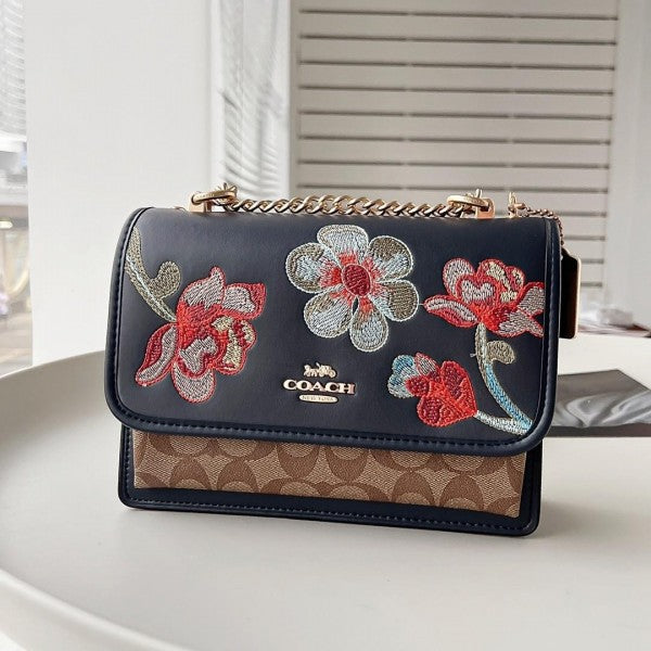 Klar_e Crossbody In Signature Canvas With Floral Embroidery Black