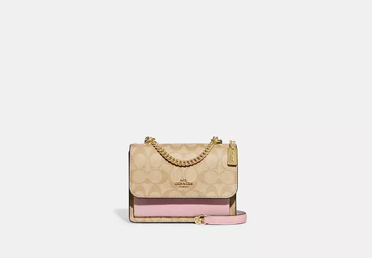 Coac_h Mini Klare Crossbody In Signature Canvas